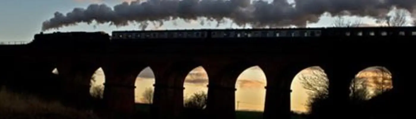 The East Lancashire Railway travelling over the Summerseat Viaduct